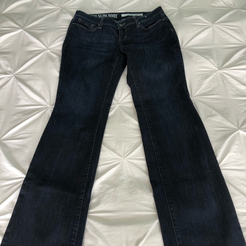 DKNY women’s blue jeans size 4x32 slim boot cut.